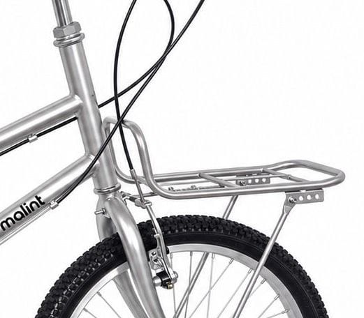 Polished front carrier rack above the front wheel