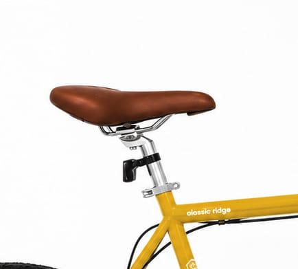 Brown saddle with the malint mark, on a silver seatpost