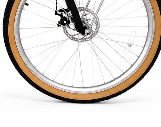 Gumwall tyre and silver rim on the front wheel