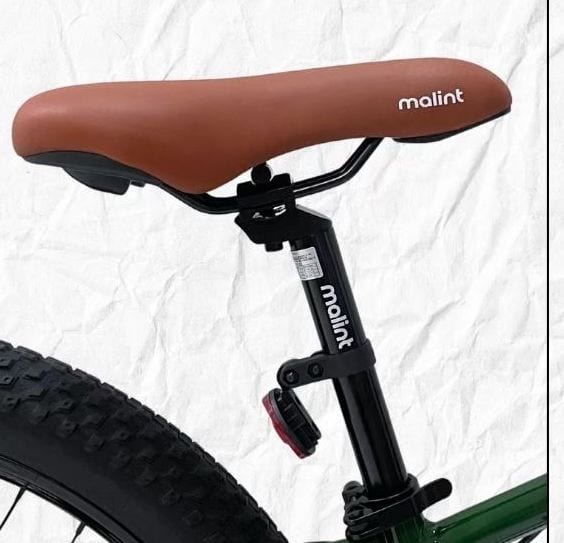 Brown saddle with the malint mark, above the rear wheel