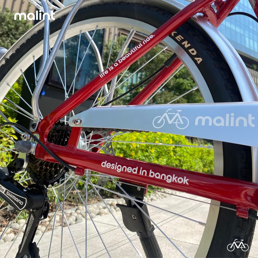 Step-through frame in red with design in bangkok lettering